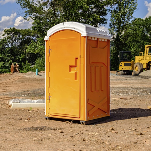 what is the cost difference between standard and deluxe portable restroom rentals in Del Rio